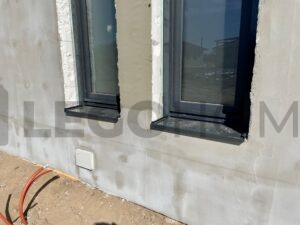házépítés menete - ablak párkányok elhelyezése